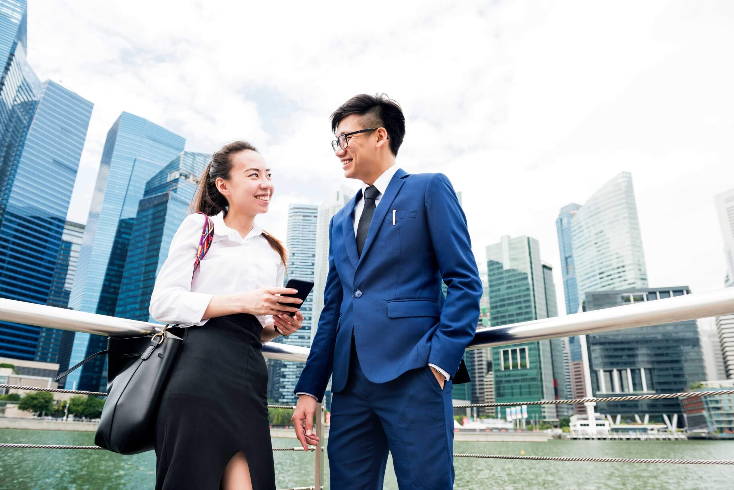 asian-business-people-in-a-city-2023-11-27-05-20-50-utc